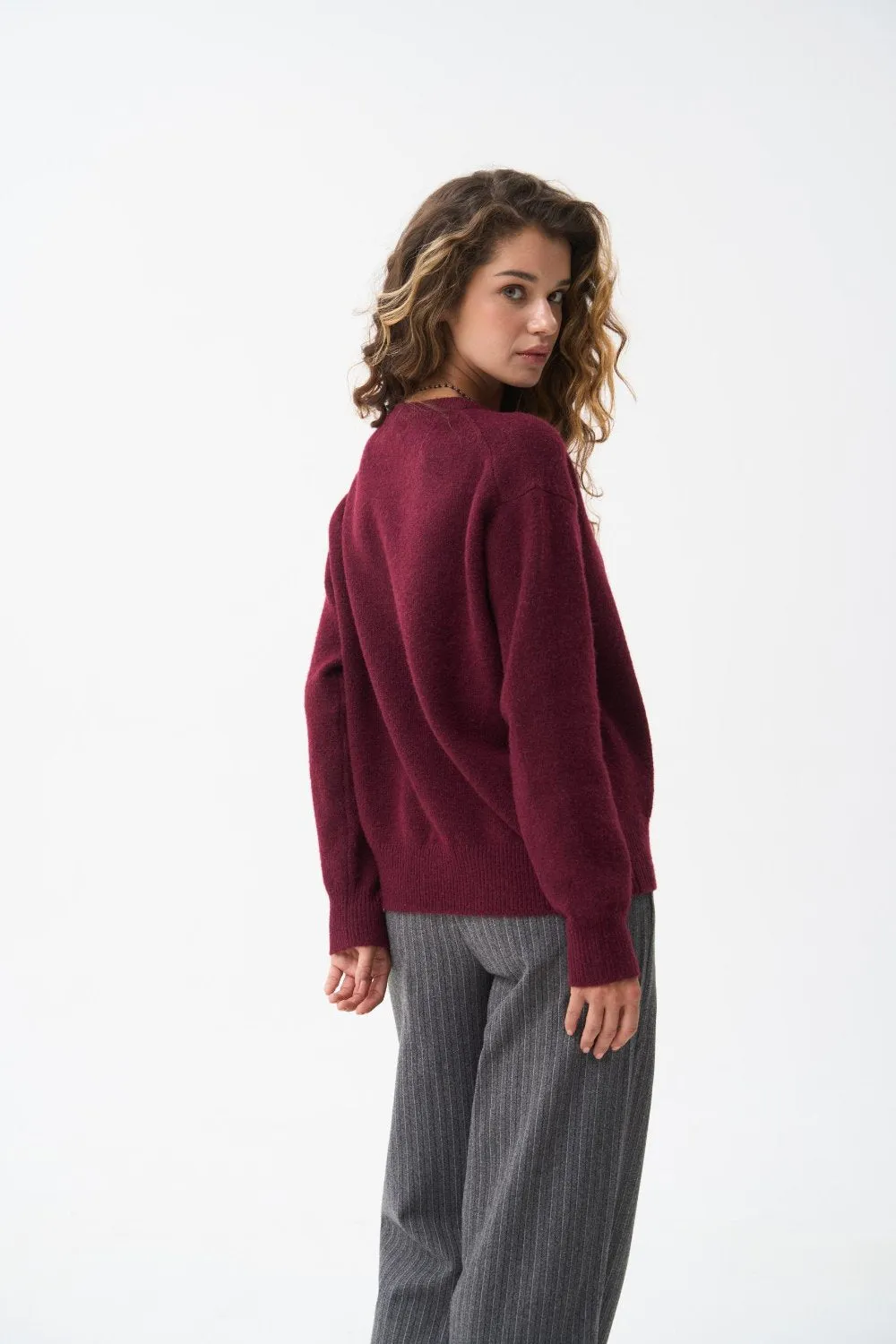 Wool sweater in color red